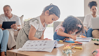 Buy stock photo Book drawing, children learning and parents working on technology while kids do art in living room of house. Girl siblings being creative for learning while family does work on tech on sofa in lounge