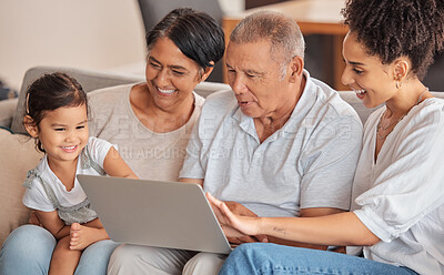 Buy stock photo Family, laptop and child watching educational video, movie or cartoon sitting with parent and grandparents on a sofa in their brazil home. Bonding, fun and internet streaming with man, women and kid