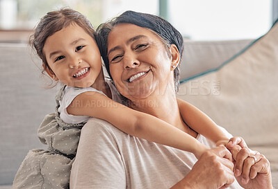 Buy stock photo Girl, grandma and sofa smile for love in bonding time together in home on holiday. Grandmother, kid and living room care, happiness and time as family in happy moment on couch in living room