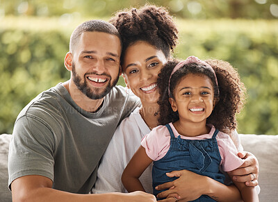 Buy stock photo Happy family, mother and father with their child love being home for bonding, quality time and relaxing together. Smile, mom and dad enjoy hugging and connecting with their young girl on the weekend