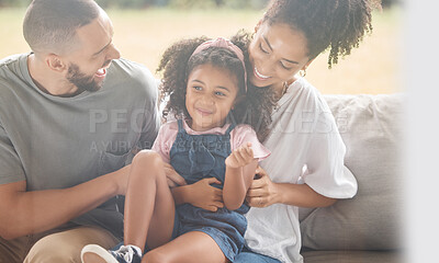 Buy stock photo Love, relax and happy family laughing on a sofa, bonding and playing in living room together. Fun, cheerful and caring parents enjoy game with little girl, quality time and happiness by black family