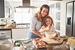 Mother with child in portrait and cooking breakfast in kitchen together for love, care and support with happiness. Smile of a young mom teaching, girl or kid learning to make food with eggs and flour