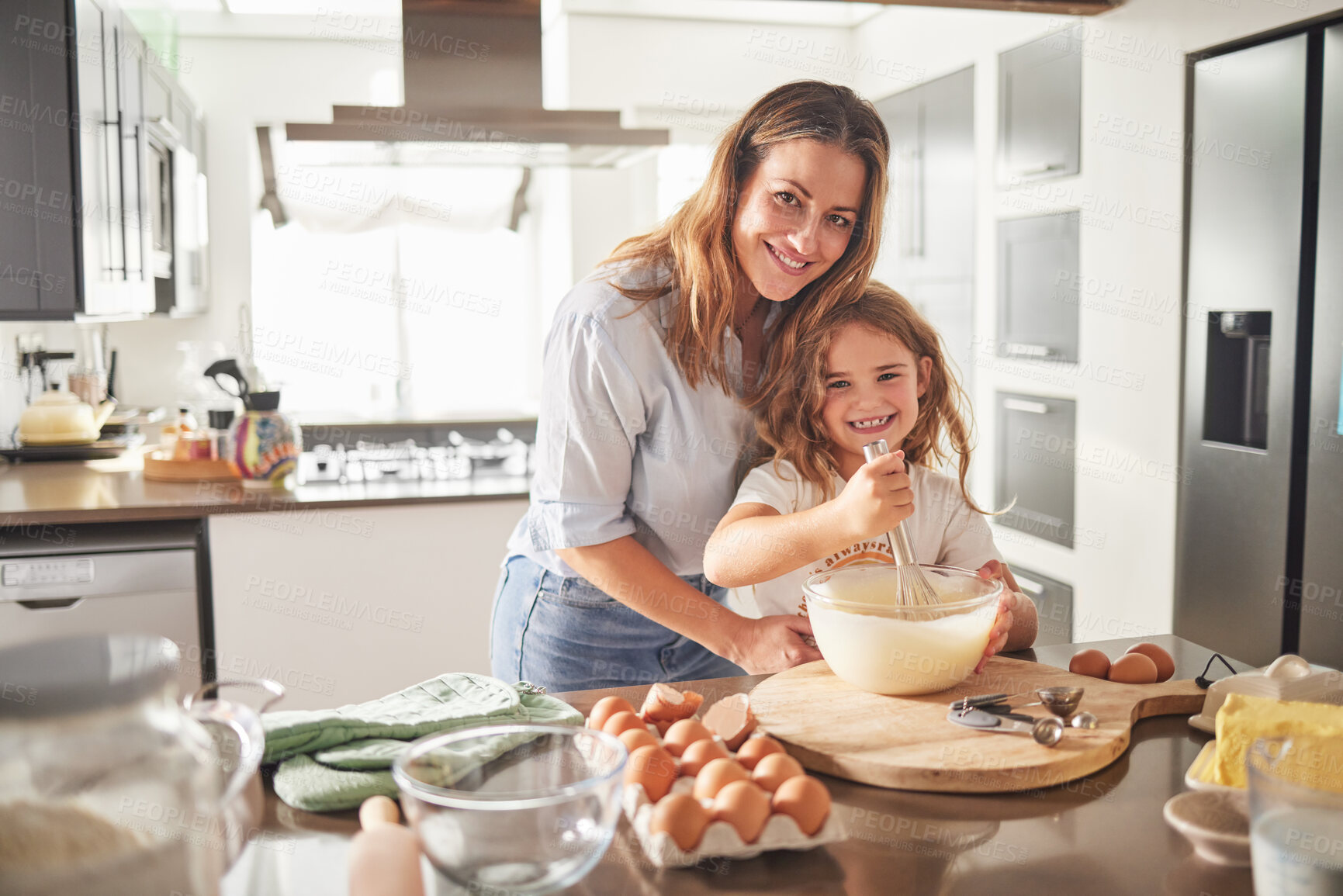 Buy stock photo Mother with child in portrait and cooking breakfast in kitchen together for love, care and support with happiness. Smile of a young mom teaching, girl or kid learning to make food with eggs and flour