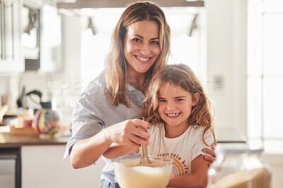 Buy stock photo Love, mother and child in kitchen cooking together for parent bonding leisure in New Zealand home. Happy, joyful and caring mom teaching and helping daughter with food preparation skill with whisk.