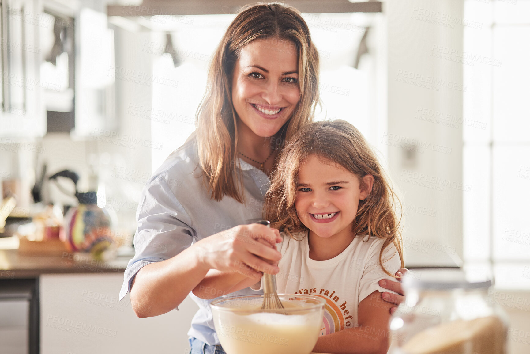 Buy stock photo Love, mother and child in kitchen cooking together for parent bonding leisure in New Zealand home. Happy, joyful and caring mom teaching and helping daughter with food preparation skill with whisk.