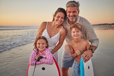 Buy stock photo Surfing, happy family on a beach for holiday outdoor wellness, healthy lifestyle and development with love, support and care. Parents or mother and father with kids portrait with surfboard by ocean