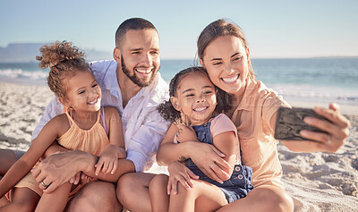 Buy stock photo Selfie, phone and family smile at beach having fun, laugh and enjoy on the sand in summer. Happy, parents and children bonding on seaside holiday, vacation and weekend cheerful with cellphone.    
