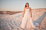 Beach wedding, bride and happy woman in a white dress while standing in sand and sun enjoying her special day at a tropical and romantic destination. Portrait of Columbia female by sea for honeymoon