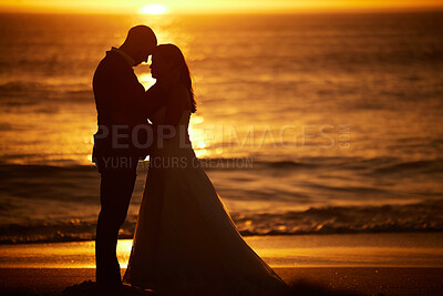 Buy stock photo Love, silhouette and couple with beach sunset bond, relax and enjoy quality time, peace and freedom of the ocean sea. Happy, marriage and romance as man and woman hug on wedding honeymoon in Mexico