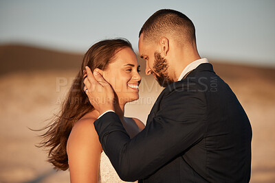 Buy stock photo Love, wedding and couple hug in nature, bonding and embracing at sunset, happy and in love. Romance, marriage and woman and man enjoy romantic celebration outdoor venue, feeling cheerful and loving