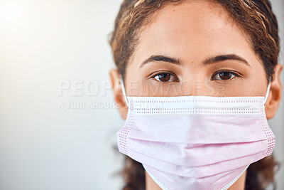 Buy stock photo Covid face mask and woman in portrait for vision, trust or hospital or clinic healthcare in studio mock up. Young nurse Innovation, compliance and safety with fear of risk for corona virus lens flare