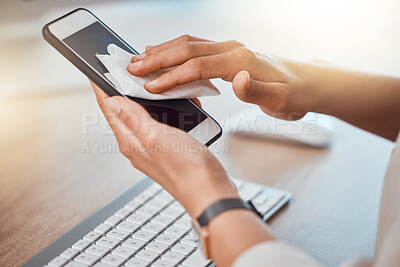 Buy stock photo Clean, office and woman hands cleaning phone screen with wet wipes for hygiene, cleaniness and disinfection of bacteria, virus or coronavirus. Closeup female hands wiping smartphone at office desk
