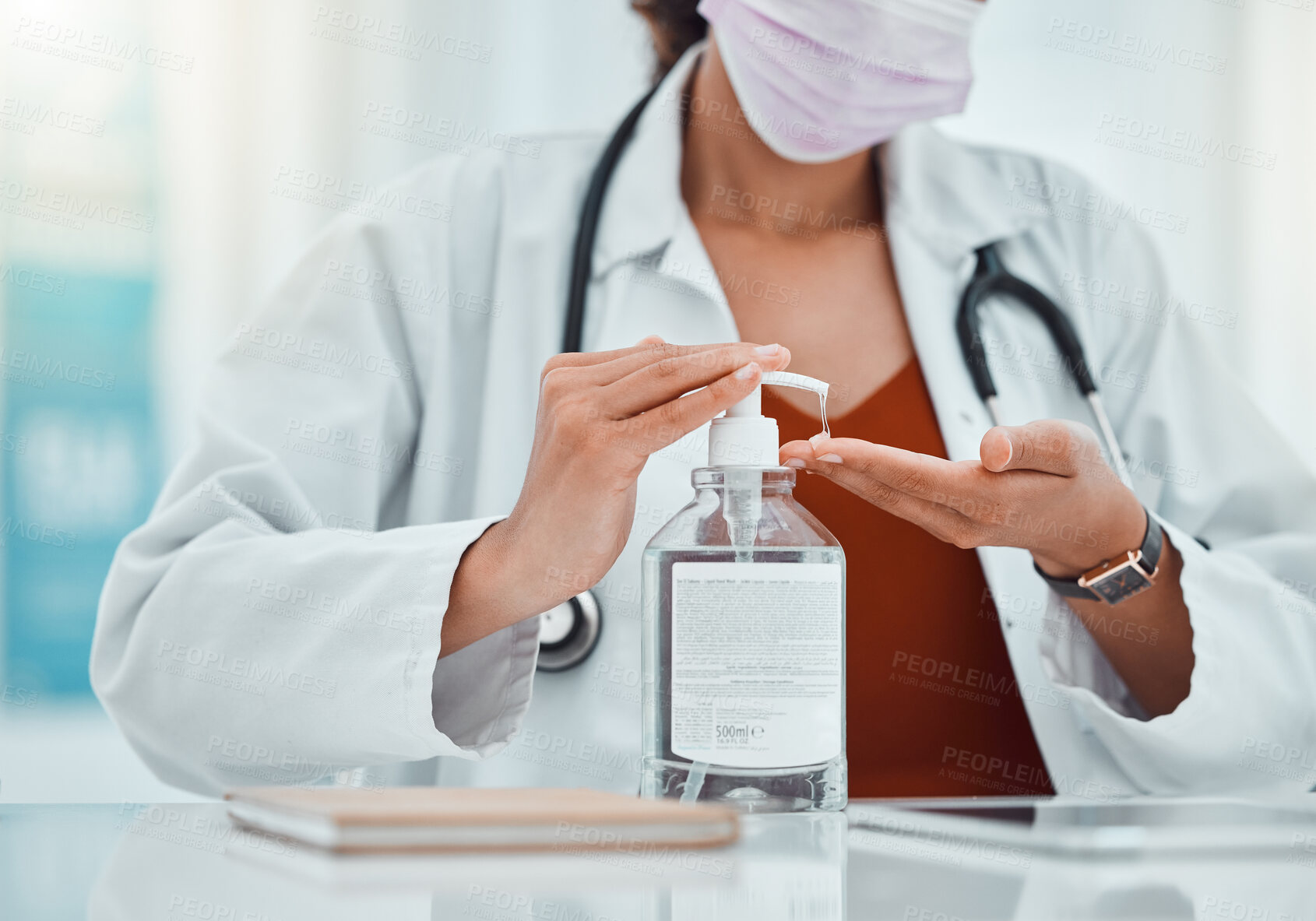 Buy stock photo Covid, hand sanitizer and doctor woman in hospital office for hand cleaning healthcare safety, risk management and compliance. Covid 19, corona virus and healthcare worker with liquid bottle product