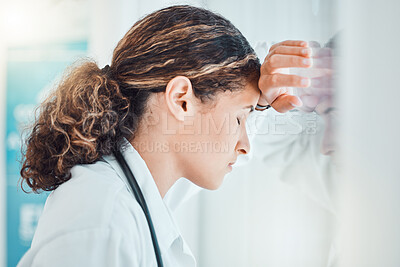 Buy stock photo Sad, stress and burnout with doctor against window with headache from healthcare, medical or nurse. Mental health, depression and anxiety with woman working in hospital while tired, fear and fail