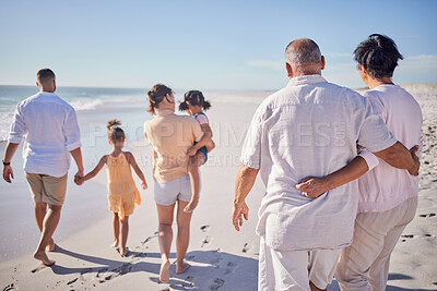Buy stock photo Big family at beach, relax on summer vacation with grandparents and kids at the sea. Retirement time together, quality travel in the sun and enjoy a holiday by the ocean. Sand, sunshine and fresh air