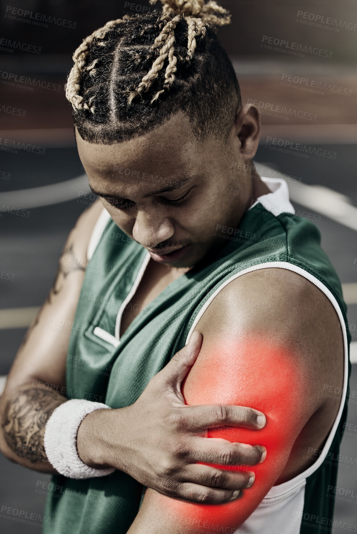 Buy stock photo Fitness, basketball and black man with sports injury in need of first aid or physiotherapy during game. Sportsman from Nigeria with hand on arm, muscle pain and medical emergency on basketball court.