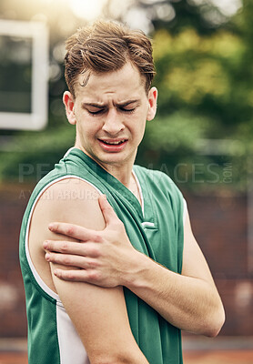Buy stock photo Muscle injury, basketball or sport pain and man with emergency arm accident during game on an outdoor court. Professional athlete with medical problem during training and exercise for sport match 
