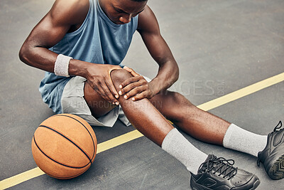 Buy stock photo Fitness, basketball knee injury or pain while on basketball court holding leg in exercise, training or sport workout. Professional athlete, health or sports man with accident in street game or event