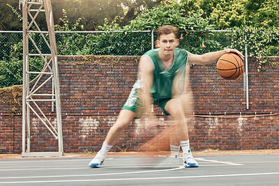 Buy stock photo Basketball, sport and fitness with a sports man training, exercising or speed dribbling on a court with motion blur effect. Exercise, workout and health with a fast athlete playing a game outside