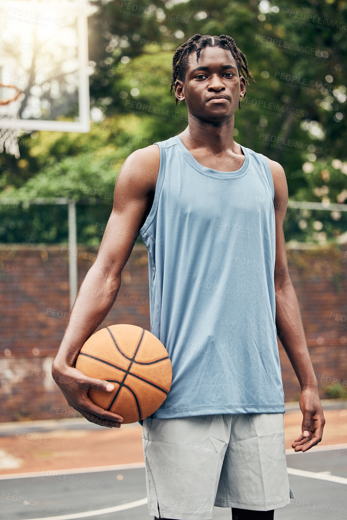 Buy stock photo Basketball player, black man portrait and outdoor sports court training, workout and game in New York, USA. Young athlete playing ball in community playground, urban action and competition with focus