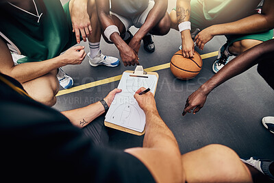 Buy stock photo Basketball, strategy and team with a sports coach talking to a team while planning tactics on a clipboard and hands. Teamwork, fitness and exercise with a player and teammates listening at training