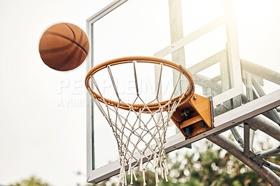 Buy stock photo Basketball, net and ball flight in sports game outdoors for match in the USA. Sport and airball of throw to score point for win, victory against fiberglass board outside in a urban town or courtyard