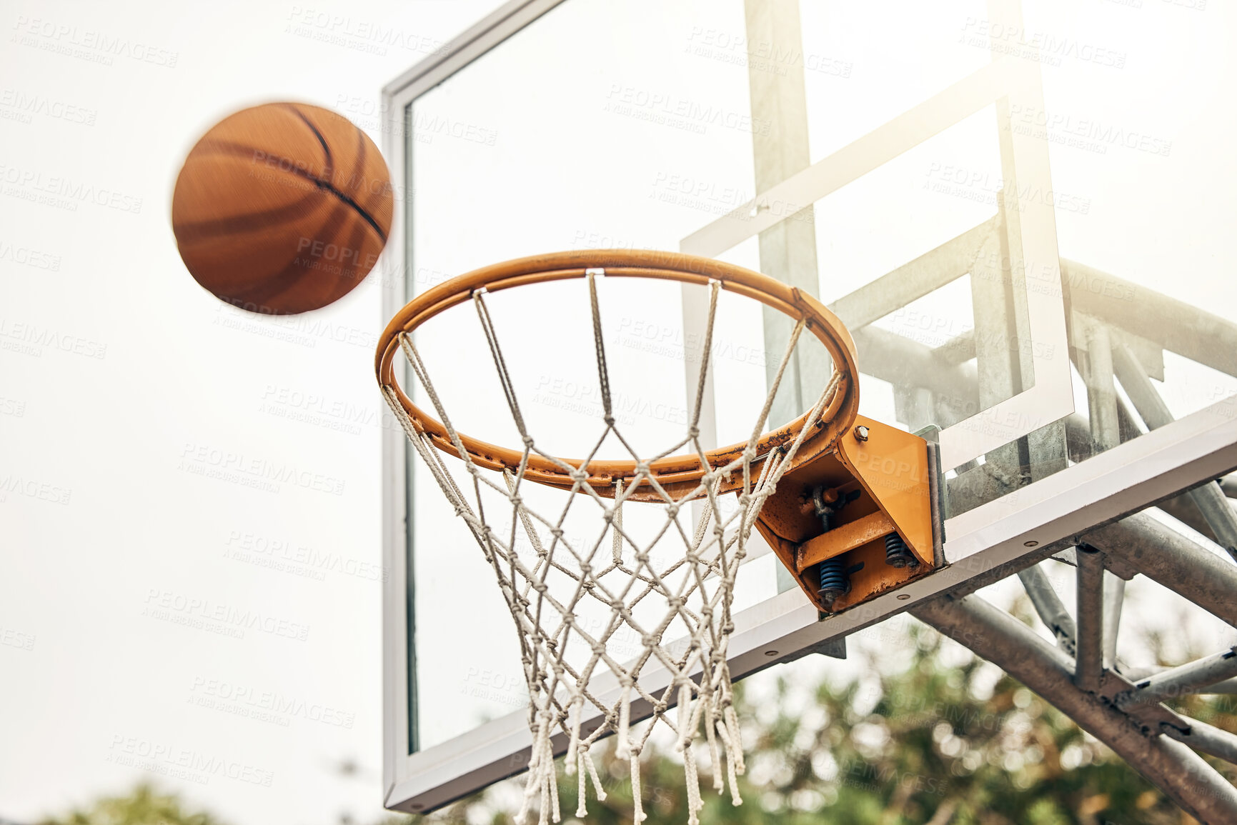 Buy stock photo Basketball, net and ball flight in sports game outdoors for match in the USA. Sport and airball of throw to score point for win, victory against fiberglass board outside in a urban town or courtyard