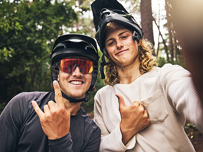 Buy stock photo Friends in forest, cool fitness selfie fitness with cycling helmet and smile with hands gesture in Australia. Workout on bicycle trail, fun travel adventure and outdoor sports training in green woods