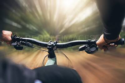 Buy stock photo Hands, man and cycling skills while on a bicycle outdoor in a forest. Adrenaline junkie practice, training or race fast in extreme sports on bike with endurance and cardio during a off road training