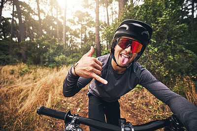 Buy stock photo Mountain bike, cycling and fitness with a man gesture a shaka hand sign while training or exercise in Brazil nature. Portrait of a professional male sports athlete doing cardio ednurance in a forest