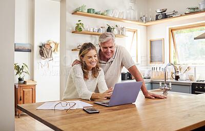 Buy stock photo Happy couple budget, laptop finance and tax while planning investment, loan and paperwork bills in home kitchen. Mature man, smile woman and online banking technology, ecommerce and retirement admin