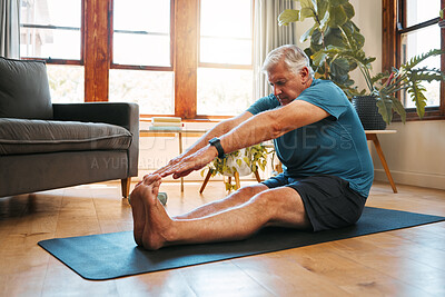 Buy stock photo Health, exercise and yoga with senior man doing ground stretching before meditation and wellness workout. Fitness, relax and floor warm up by elderly male start healthy cardio training in living room