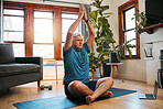 Yoga, meditation and wellness with a zen man following an online class for fitness, exercise and workout at home. Senior, retirement and health with an elderly male pensioner exercising in his house