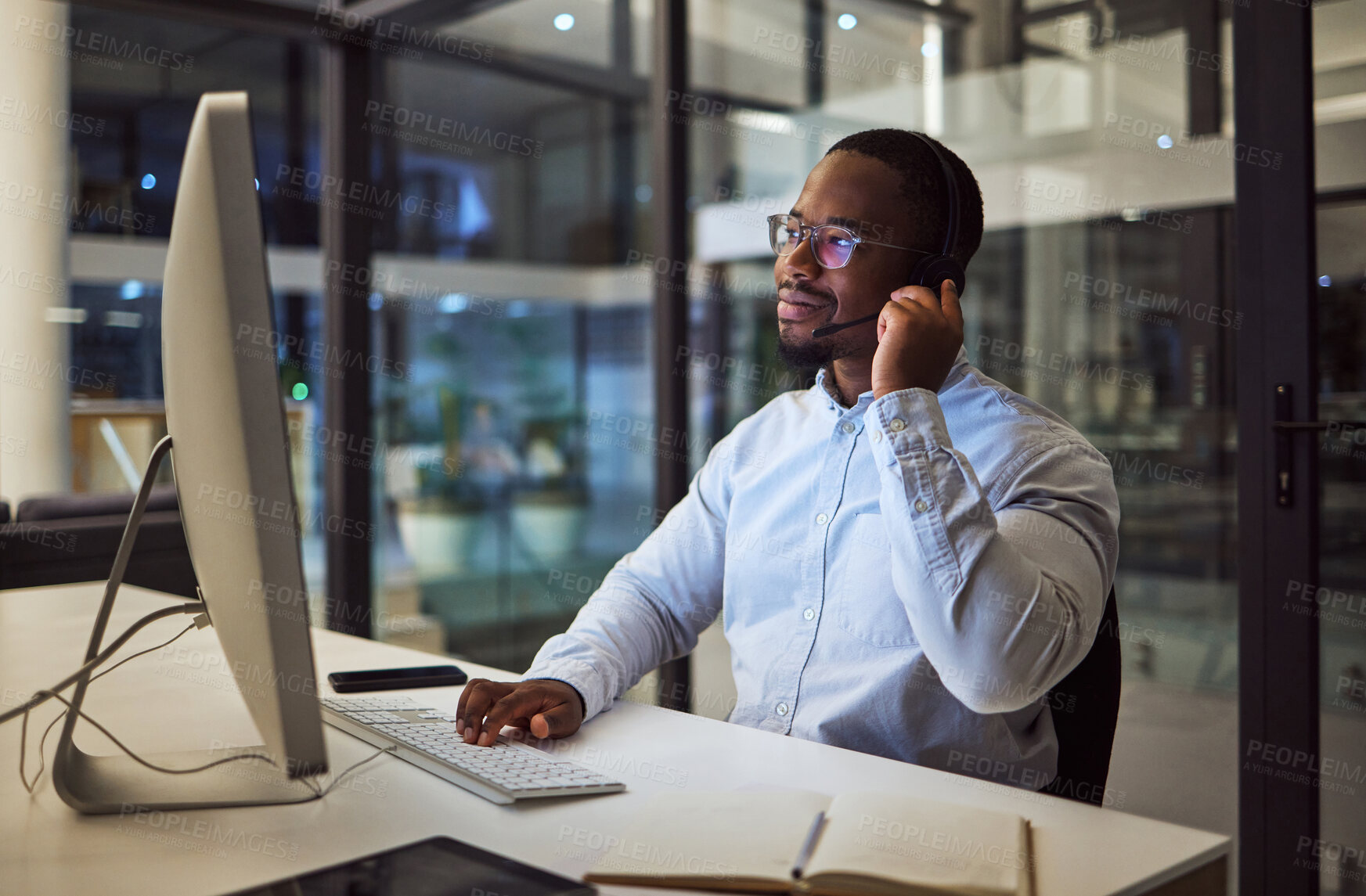 Buy stock photo Call center, CRM or customer service working black man with telemarketing or customer support in office. Consultant, contact us or help desk agent consulting, support or advice with questions