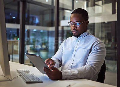 Buy stock photo Black businessman, tablet and data analysis with computer in night office for digital marketing software, cybersecurity code or kpi. Thinking programmer, developer or website designer with technology