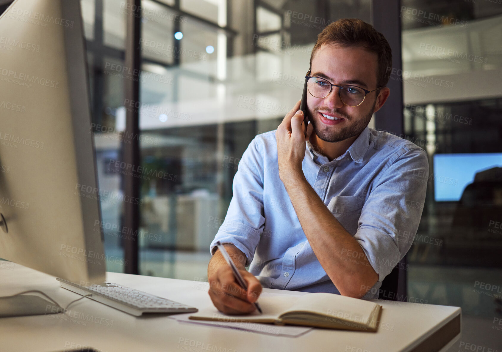 Buy stock photo Business phone call, internet research and businessman planning idea on computer in dark office at night. Corporate manager writing notes and speaking on cellphone for strategy during late overtime