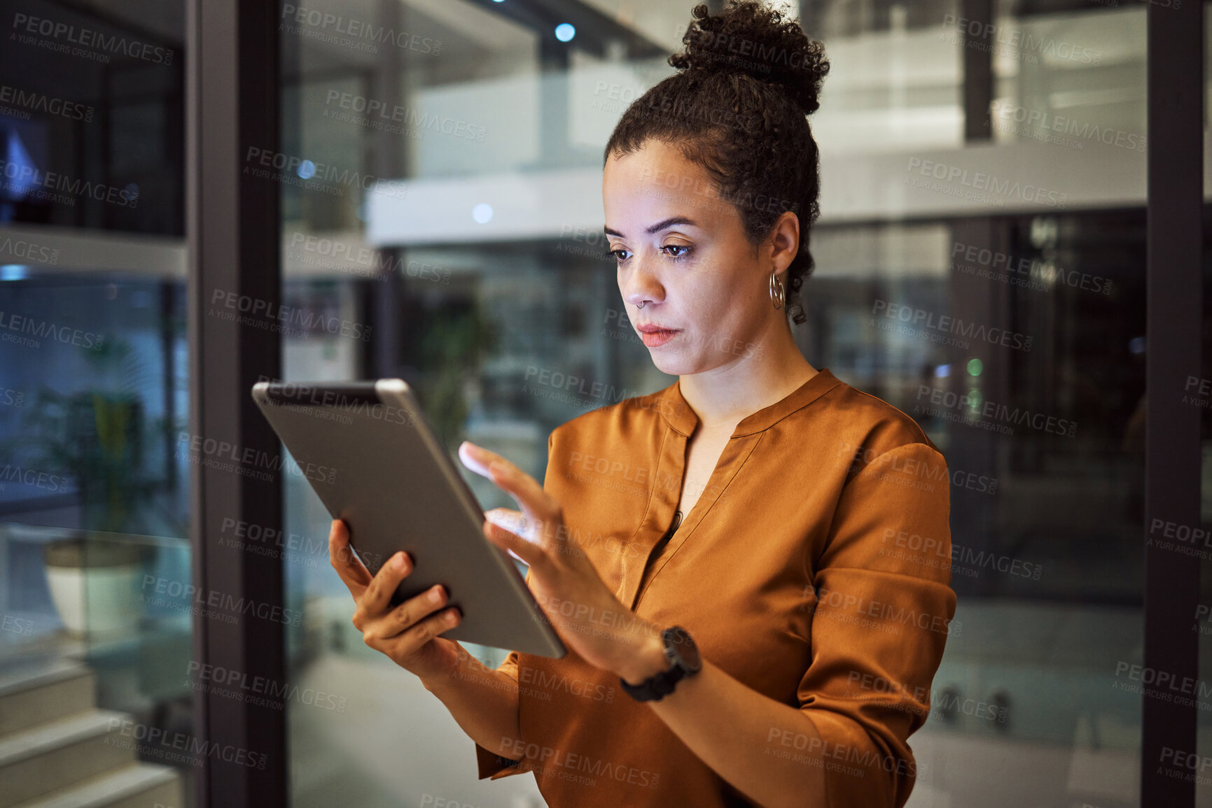 Buy stock photo Tablet, night and research with a business woman working late on the internet while on the search for data or information technology. Innovation, cloud computing and ux with a female employee at work