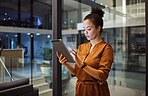 Tablet, working and woman employee planning and typing a digital strategy in a office. Business, tech and online employee using technology to do internet and web research for a startup project