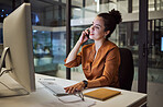 Phone, communication and networking with a businesswoman on call while working on a computer in her office late at night. Research, report and deadline with a female employee at her work desk