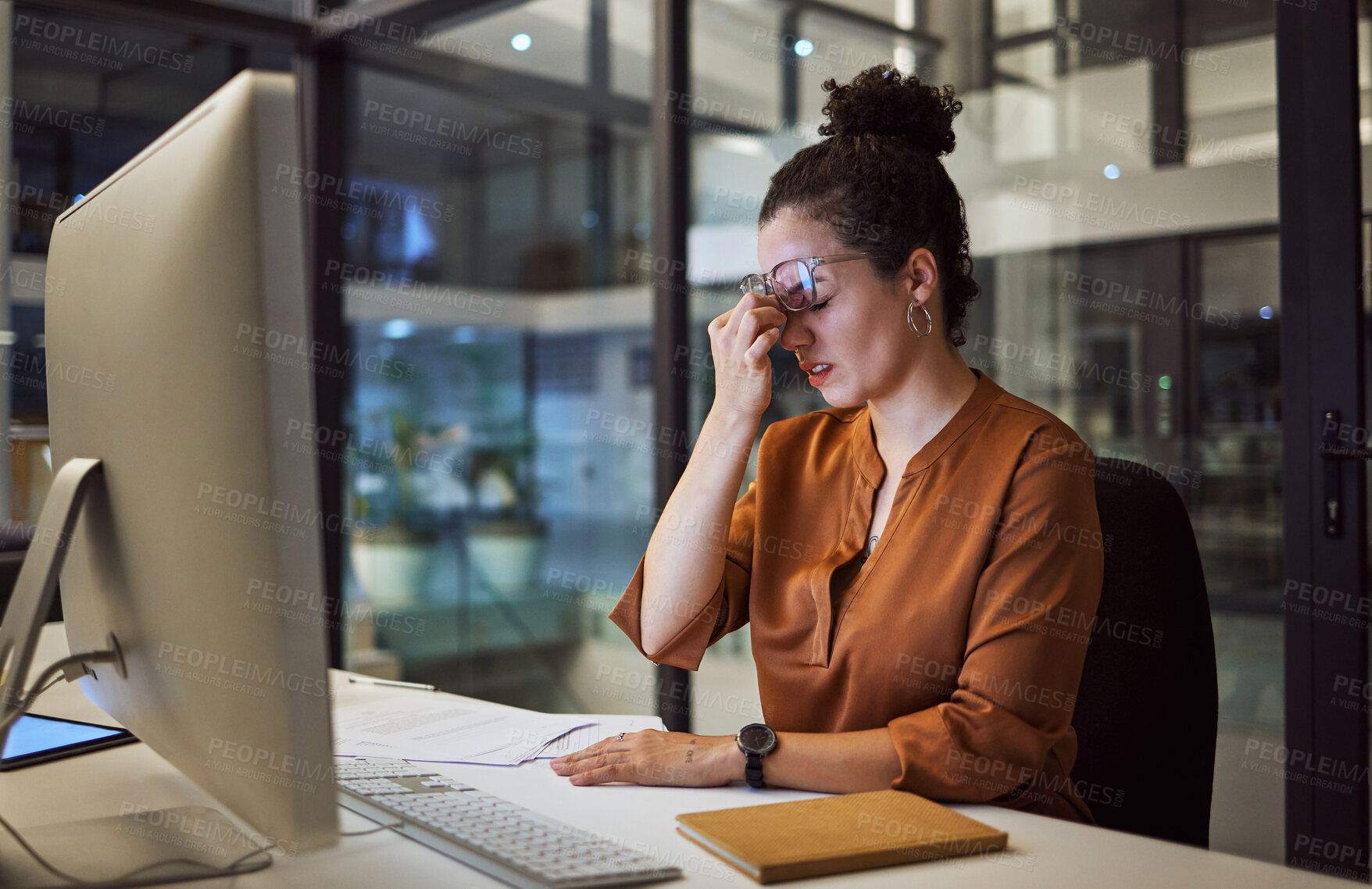 Buy stock photo Stress, tired and frustrated business woman working on a computer at the desk in her office. Burnout, headache and corporate manager planning a company management strategy report with technology.