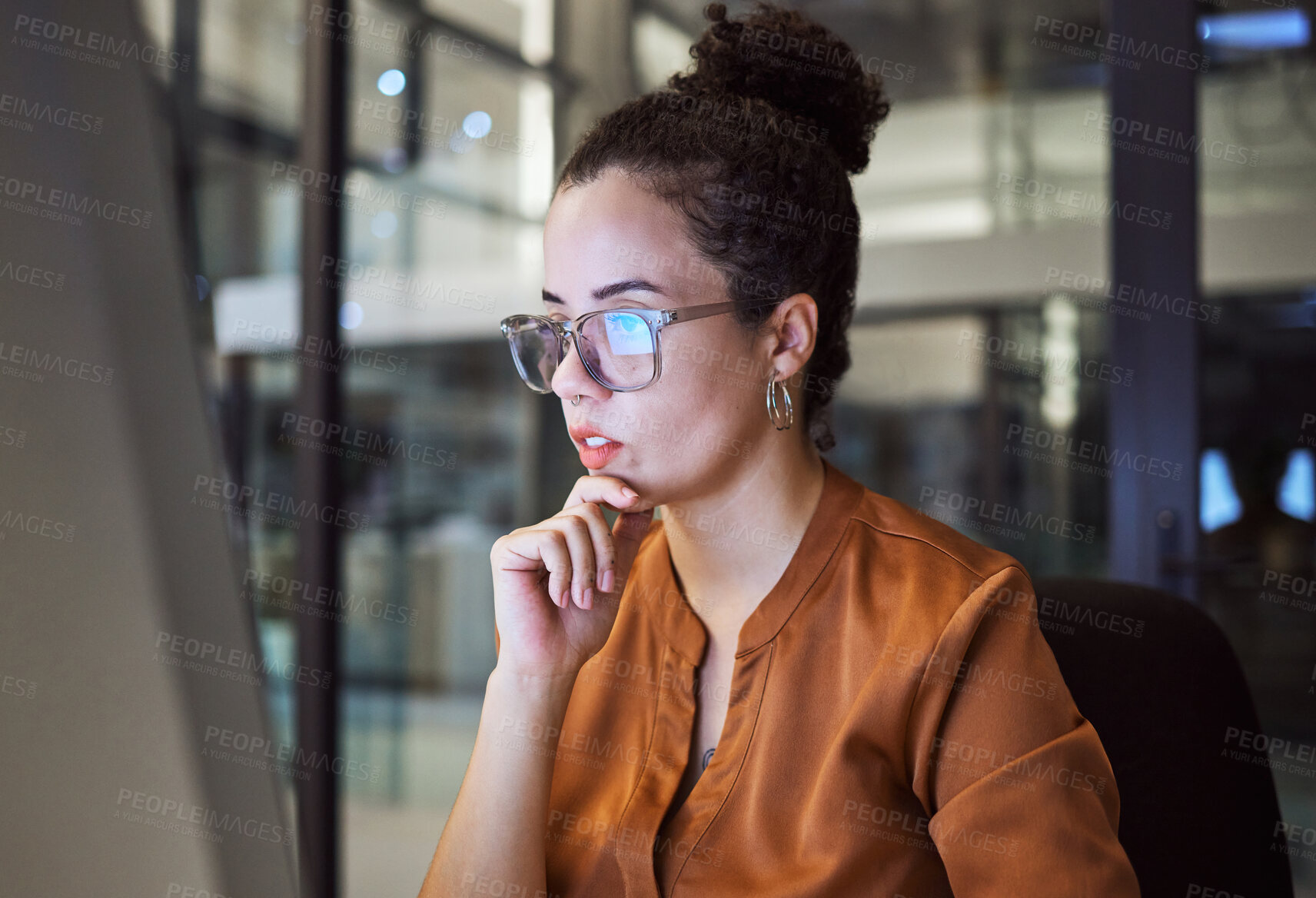 Buy stock photo Night work, planning and business woman reading an email about web design in a dark office. Software worker programming, coding and working in information technology with overtime on a pc at company