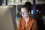 Woman, reading and glasses reflection in office at night, working on computer email or planning business schedule. Female worker, pc tech screen and overtime web research in dark company workplace.