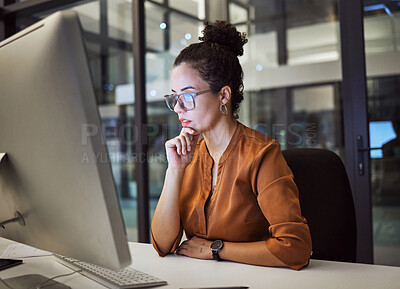 Buy stock photo Woman, computer and office with glasses show reflection on face while working overtime. Girl, thinking and idea read analytics, email or communication online at work late at business in the night