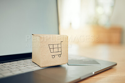 Buy stock photo Online shopping, box and laptop with credit card for payment of product, purchase or service goods. Fintech, cardboard trolley logo and finance bank card for e commerce, cyber retail market and sales