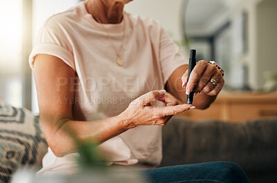 Buy stock photo Healthcare, diabetes and a senior woman using blood sugar test on finger in living room. Health, innovation and daily life of diabetic lady on sofa with glucometer to check glucose level in her home.