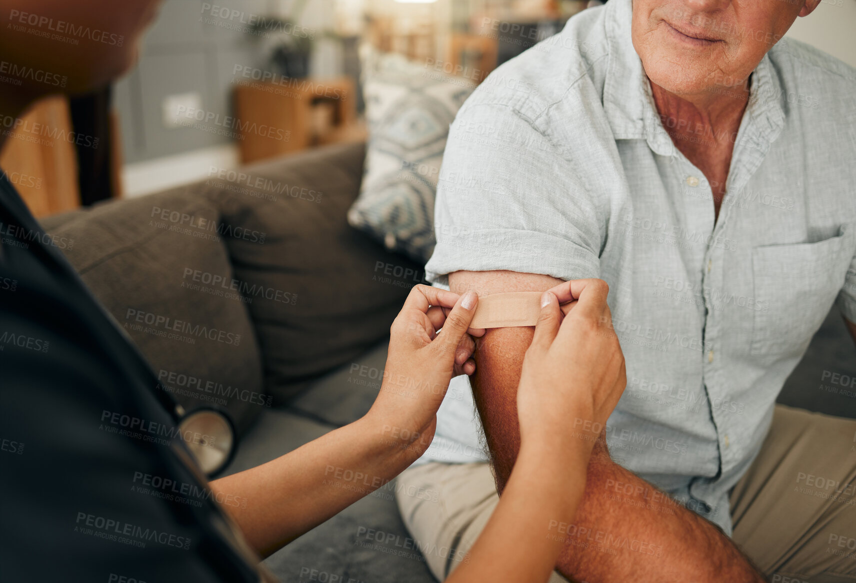 Buy stock photo Covid, vaccine and plaster with a doctor and patient consulting during a home medical visit. Healthcare, medicine and trust with a nurse and senior man in a house during the corona virus pandemic