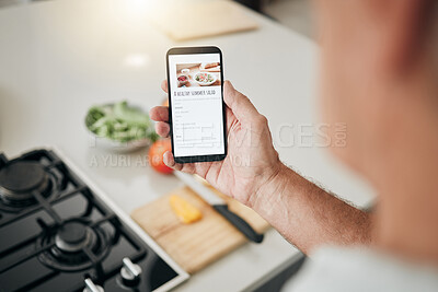 Buy stock photo Phone screen, cooking recipe and man with healthy kitchen salad information on website, digital blog or vegan food app. Hand with smartphone, internet or online inspiration advice for green lifestyle