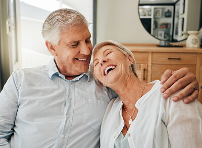 Buy stock photo Love, happy family and senior couple laugh and relax in living room, bond and share funny joke in their home. Retirement, humour and affection by sweet elderly man and woman hug, enjoy time together