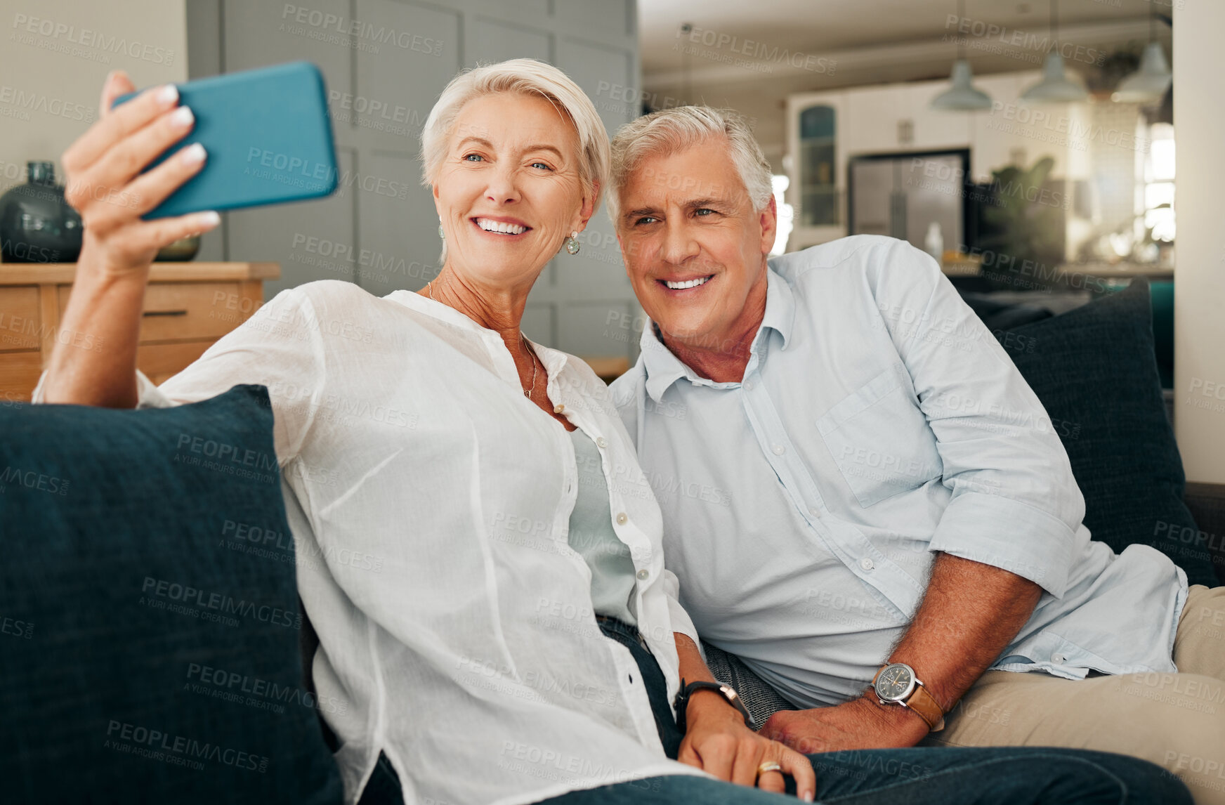 Buy stock photo Senior couple selfie, video call phone and living room sofa for relax, digital connection and social networking together at home. Happy man, smile woman or retirement people take mobile photos online