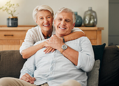 Buy stock photo Happy senior couple on sofa hug, happy and smile in living room for retirement, love and happiness at home. Portrait, retired and together elderly man and woman care, support and joy on lounge couch